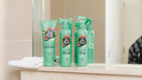Furtastic collection in bathroom setting in front of mirror