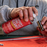 Product image of Shooter's Choice Shotgun and Choke Tube Cleaner in use cleaning a shotgun choke tube