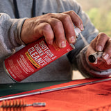Product image of Shooter's Choice Shotgun and Choke Tube Cleaner in use cleaning a shotgun choke tube