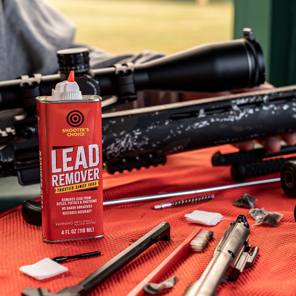 Shooter's Choice Lead Remover 4oz still life image with a Brenton Tracker AR-15