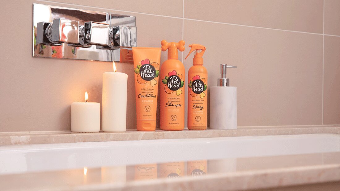 Ditch the Dirt collection in bathroom with candles