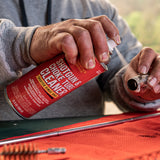 Product image of Shooter's Choice Shotgun and Choke Tube Cleaner  in use cleaning a shotgun choke tube